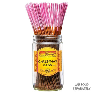 A pack of Christmas Kiss™ Wild Berry Incense sticks, featuring festive holiday scent notes of crisp bayberry, fresh pine, and warm cinnamon.